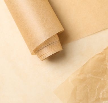 Fresh bakery wrapped in paraffin paper showing clean and elegant packaging.