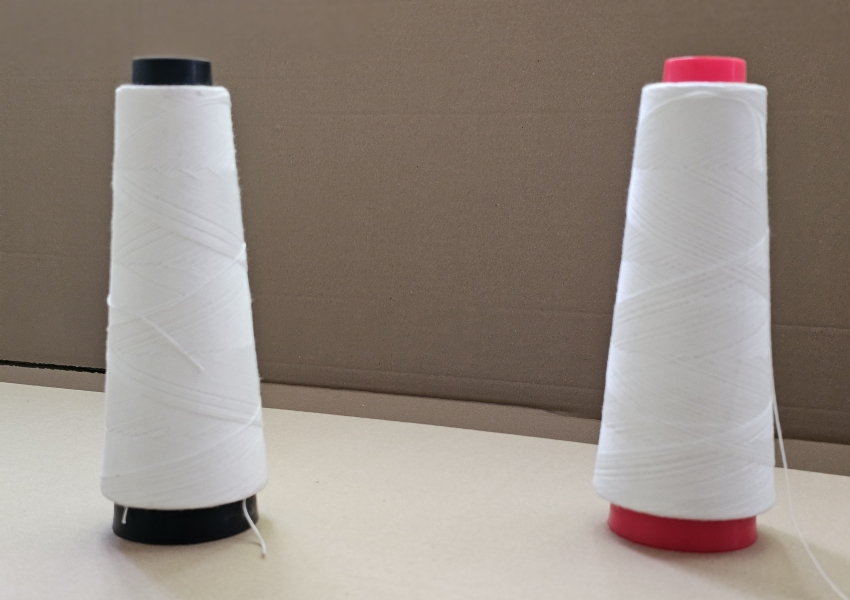 Paraffin-coated polyester thread