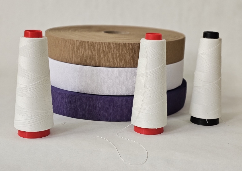 Paraffin-coated polyester thread