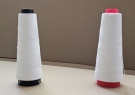 Paraffin-coated polyester thread