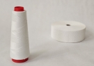 Paraffin-coated polyester thread
